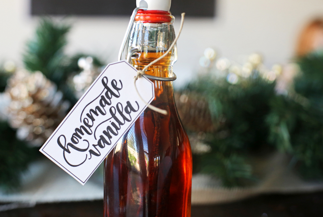 You can't believe how easy it is to make your own vanilla! The perfect neighbor or teacher gift for the holidays, plus download these cute free tags. homemade vanilla