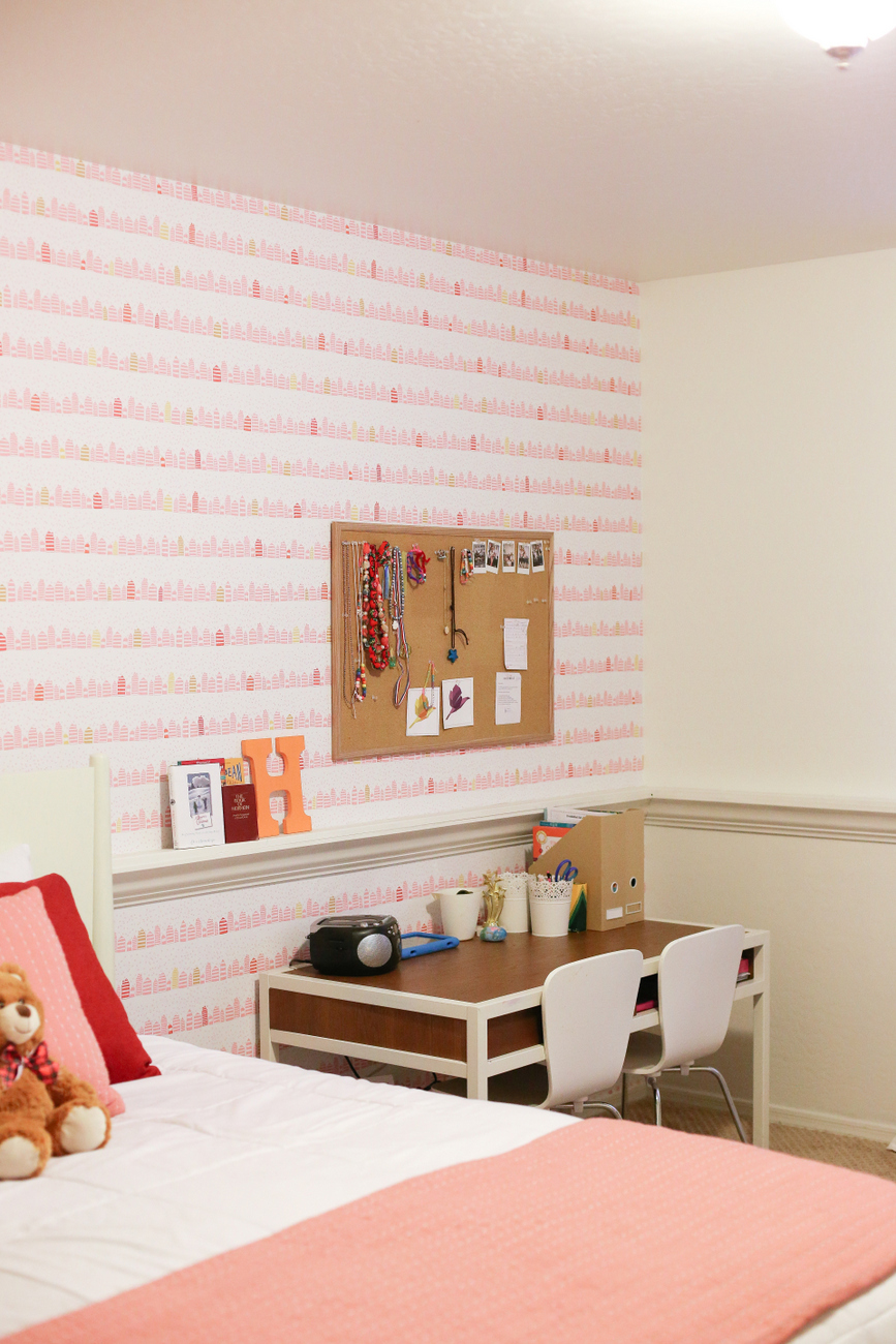 A little girl room with wallpaper from Spoonflower with a modern and fun whimsical pink and gold print that makes a room feel special