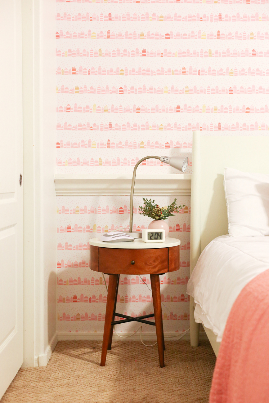 A little girl room with wallpaper from Spoonflower with a modern and fun whimsical pink and gold print that makes a room feel special