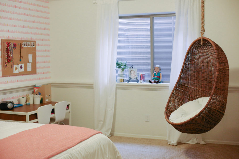 A little girl room with wallpaper from Spoonflower with a modern and fun whimsical pink and gold print that makes a room feel special