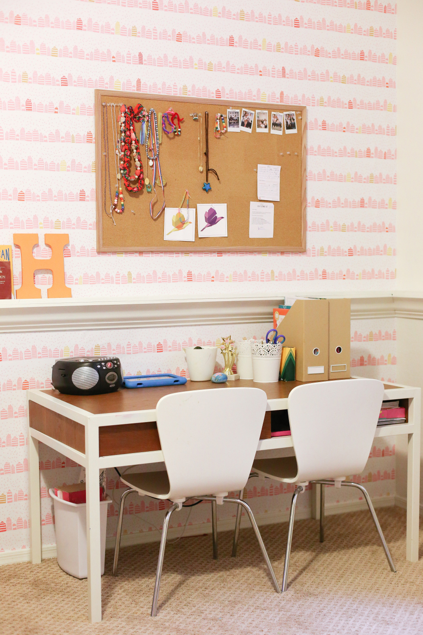 A little girl room with wallpaper from Spoonflower with a modern and fun whimsical pink and gold print that makes a room feel special