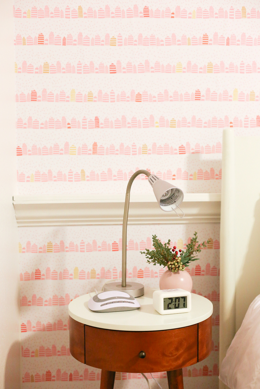 A little girl room with wallpaper from Spoonflower with a modern and fun whimsical pink and gold print that makes a room feel special